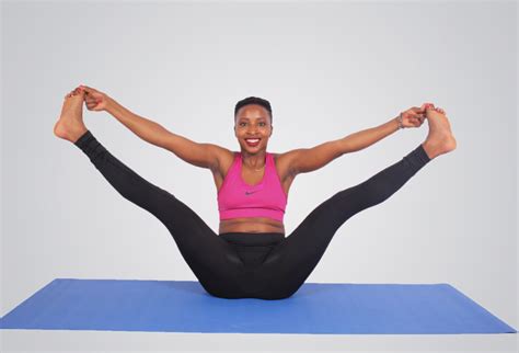 Flexible Woman Doing Yoga Pose. Side Split Touching Toes