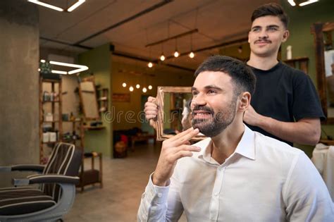 Hairdresser Resenting the Result of His Work To Client Stock Image - Image of mirror, handsome ...