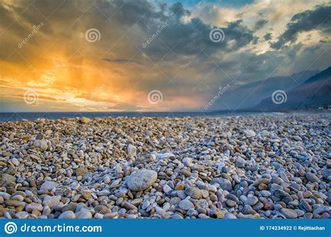 Pebble Beach during Sunset stock photo. Image of escape - 174234922