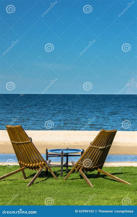 Relaxing Tanning Beds on Remote Beach. Stock Photo - Image of climate, nature: 62990102