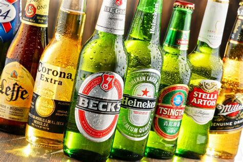 Bottles of Assorted Global Beer Brands Editorial Photo - Image of original, drop: 74933726