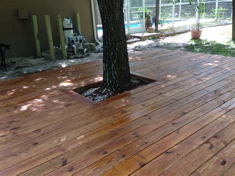 Our new, freshly stained deck. We used Olympic Elite Woodland Oil in the Mountain Cedar color ...