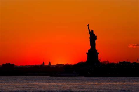 Statue of Liberty Goes Dark Night Before International Women's Day