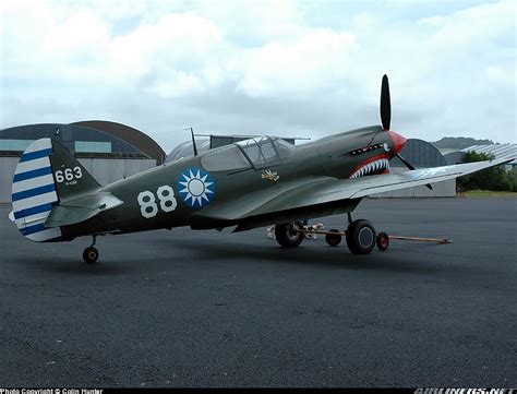 Asisbiz Airworthy warbird Curtiss P-40N Warhawk NZ3009 Flying Tigers 88 02