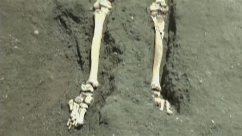 Archaeologists uncover skeleton of man crushed by stone as he fled ...