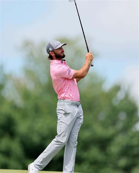 Download Max Homa Pink Shirt Golf Swing Wallpaper | Wallpapers.com