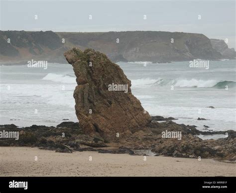 Rock Formation At Beach Stock Photo - Alamy