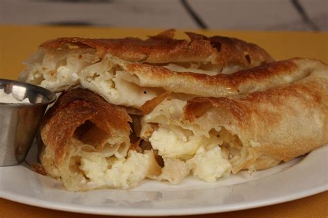 Traditional Bosnian food called "Pita sirnica". | Food, Bosnian recipes, Grilled lamb