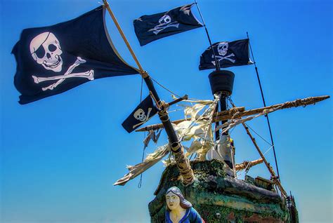 Four Black Flags On Pirate Ship Photograph by Garry Gay - Pixels