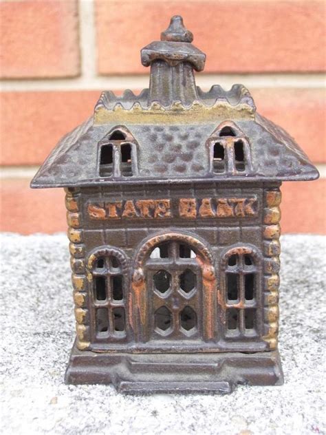 ANTIQUE CAST IRON STILL COIN BANK - BUILDING STATE BANK | Antique cast ...