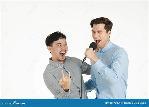 Two Men Singing Karaoke Pose Stock Image - Image of handsome ...