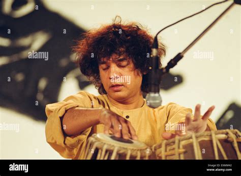 Zakir Hussain Playing Tabla High Resolution Stock Photography and ...