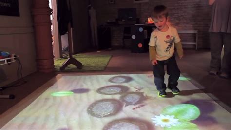 Testing our interactive floor projector - YouTube