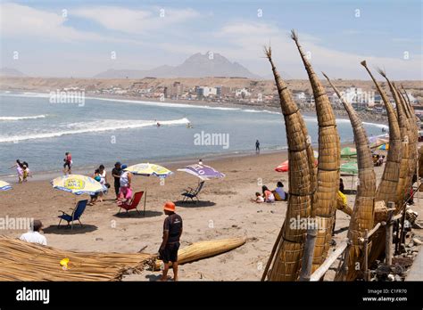 Huanchaco beach near Trujillo, Peru, with caballitos de totora and ...