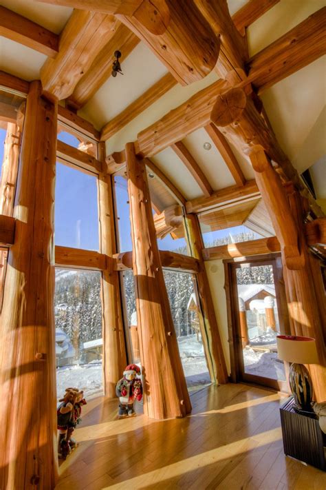 Cedar post and beam, Curved timber roof. glass forest. | Timber roof, Log homes, Log home interiors