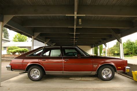 OLD PARKED CARS.: 1979 Oldsmobile Cutlass Salon Brougham Aeroback Sedan.