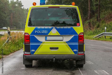 Police car from behind. Rear view of a radio patrol car from the ...