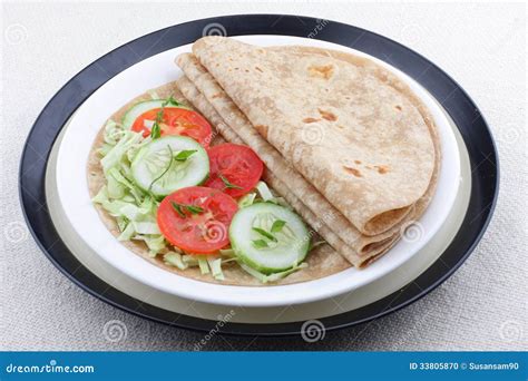 Fresh Homemade Chapati and Vegetables. Stock Photo - Image of atta, flatbread: 33805870