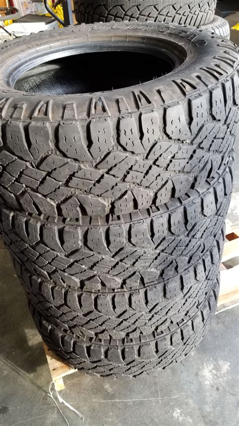 SET OF 4 GOODYEAR WRANGLER LT 265 70 R17 TIRES - Big Valley Auction