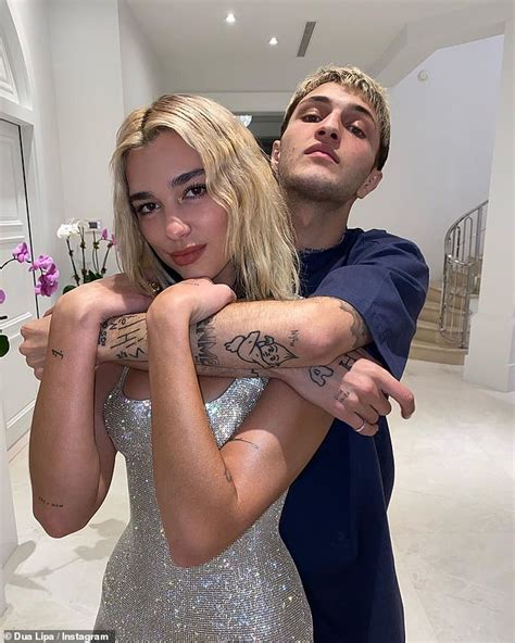 Dua Lipa shares steamy New Year's Eve kiss with Anwar Hadid at Miami ...