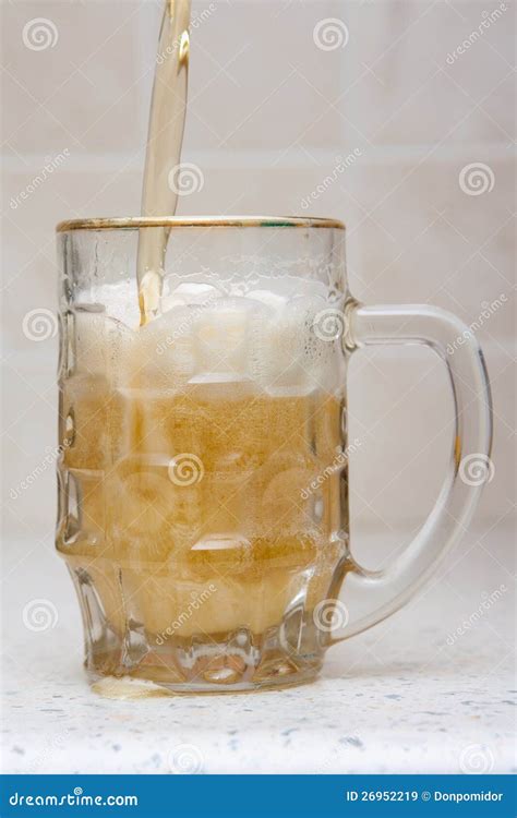 Beer Pouring from Bottle into Glass Stock Image - Image of full, froth: 26952219