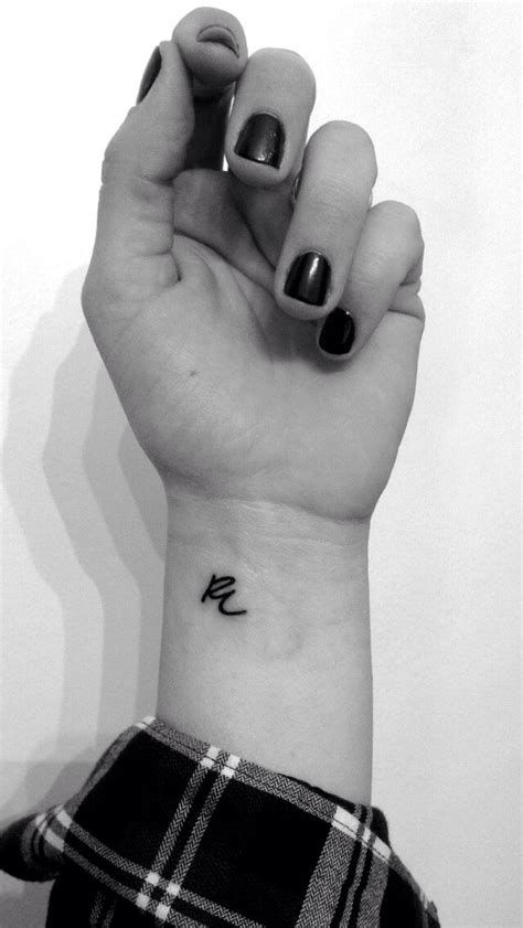 Minimalist wrist tattoo. My girlfriend's initials in her handwriting. | Initial tattoo, Initial ...