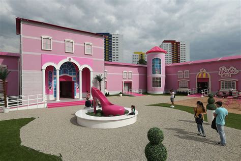 Activists protest life-size Barbie's 'Dreamhouse'