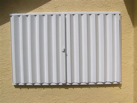 Beige Hurricane Accordion Shutters for Sale in Tamarac, FL - OfferUp