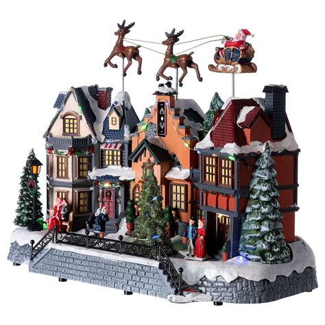 Animated musical Christmas village with Santa and reindeers | online ...