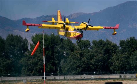 Photos: Back in LA from Canada, two Super Scooper firefighting aircraft ...