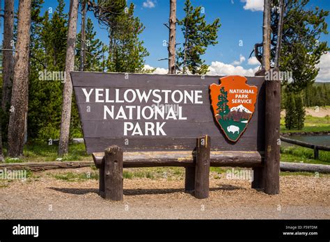 The Yellowstone National Park south entrance sign, Wyoming, USA Stock Photo - Alamy