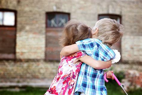 Cute Little Boy and Girl Hug Stock Image - Image of caucasian, childhood: 29692719