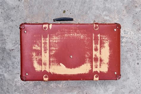 Premium Photo | Vintage retro red suitcase, close up. old case