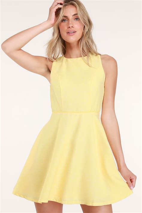 Winsome Yellow Backless Skater Dress