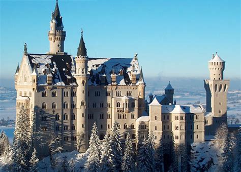 Neuschwanstein Castle in winter. It is located above the village of ...