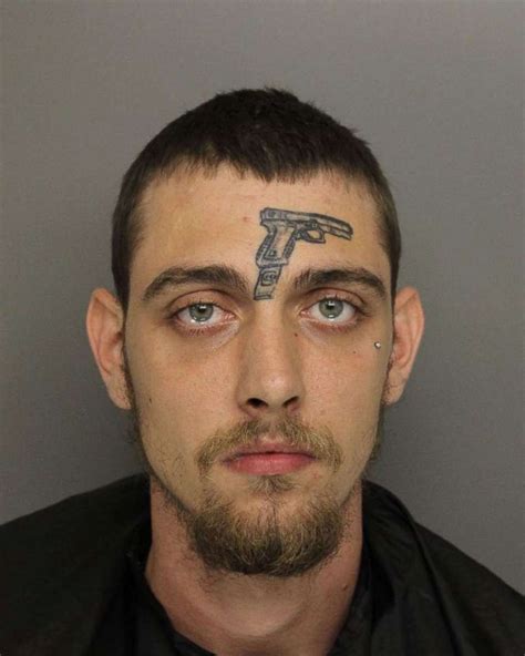 Man with gun tattoo on face arrested for gun possession - ABC News