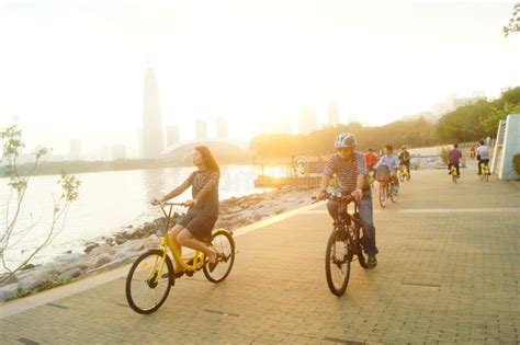 Shenzhen, China: Tourists Travel by Bike in Shenzhen Bay Park Editorial ...