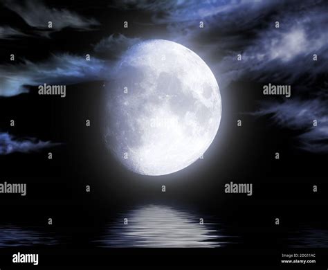 Full moon reflected in water Stock Photo - Alamy