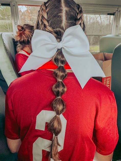 by far my fav softball hairstyle :) | Softball hairstyles, Volleyball hairstyles, Cheerleading ...