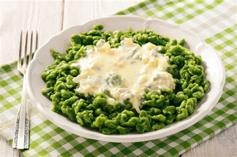 German Dumplings Spaetzle with Spinach and Cheese Sauce. Stock Photo - Image of cheese, dish ...