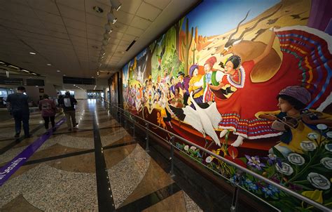 The true story behind the conspiracy-ridden murals at Denver International Airport