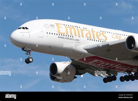 Emirates Airbus A380-800 double decker plane coming down to land at London Heathrow Airport in ...