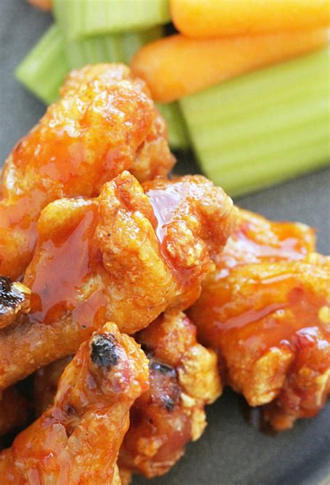 Crispy Baked Chicken Wings - with the best buffalo sauce - Foodtastic Mom