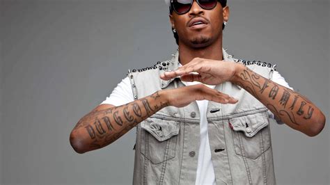 Download Future Rapper Pfp With Arm Tattoos Wallpaper | Wallpapers.com