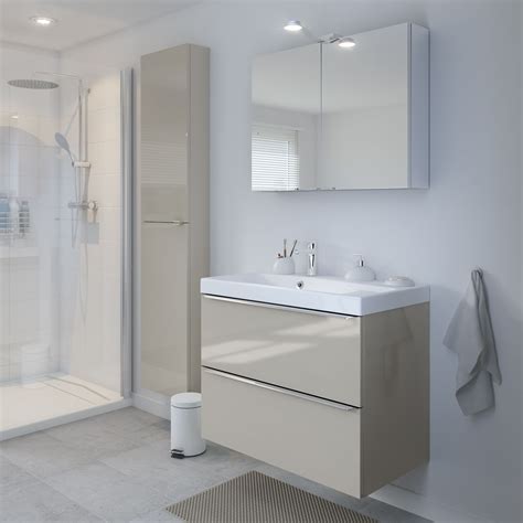 Storage is essential in busy bathrooms. The Imandra gloss taupe wall cabinet is perfect for ...