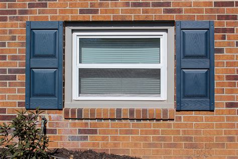 How to Hang Shutters on Brick