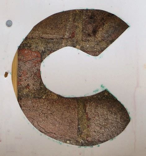C | Letter C From a cutout-lettered sign mounted on a brick … | Flickr