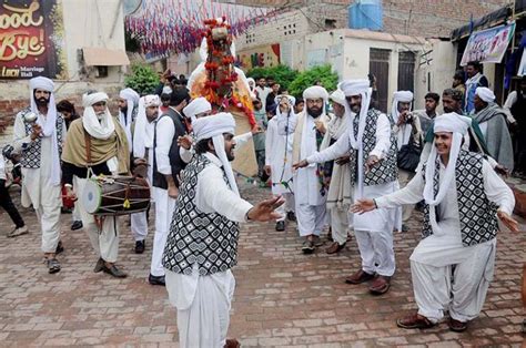 Artists performing traditional dance during a function to mark Baloch Culture Day