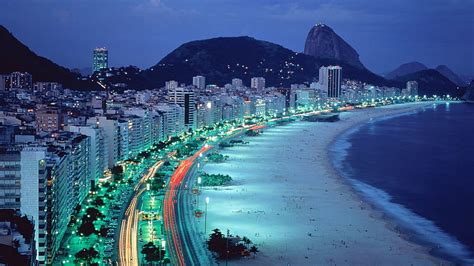 Night beach in a city, beach, city, water, lights, HD wallpaper | Peakpx