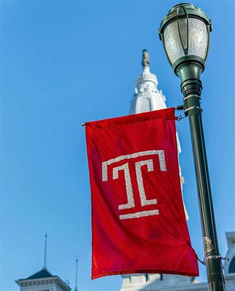 Onward with Temple, banners all unfurled, wide flung our standards, to the winds they're hurled ...